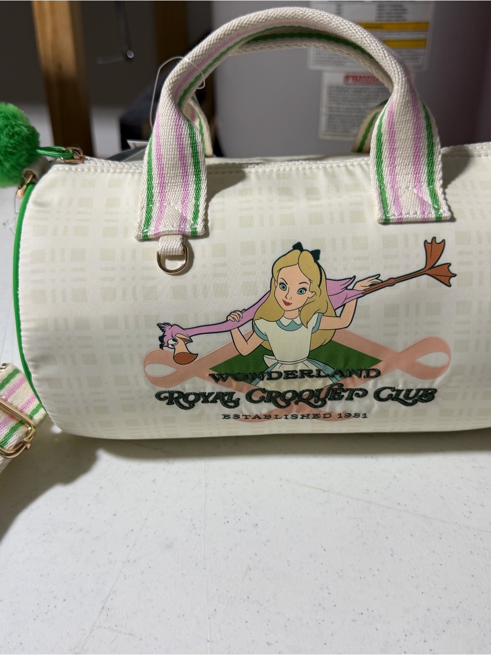 Alice in Wonderland Cream Graphic s small barrel crossbody handbag Duffel Bag